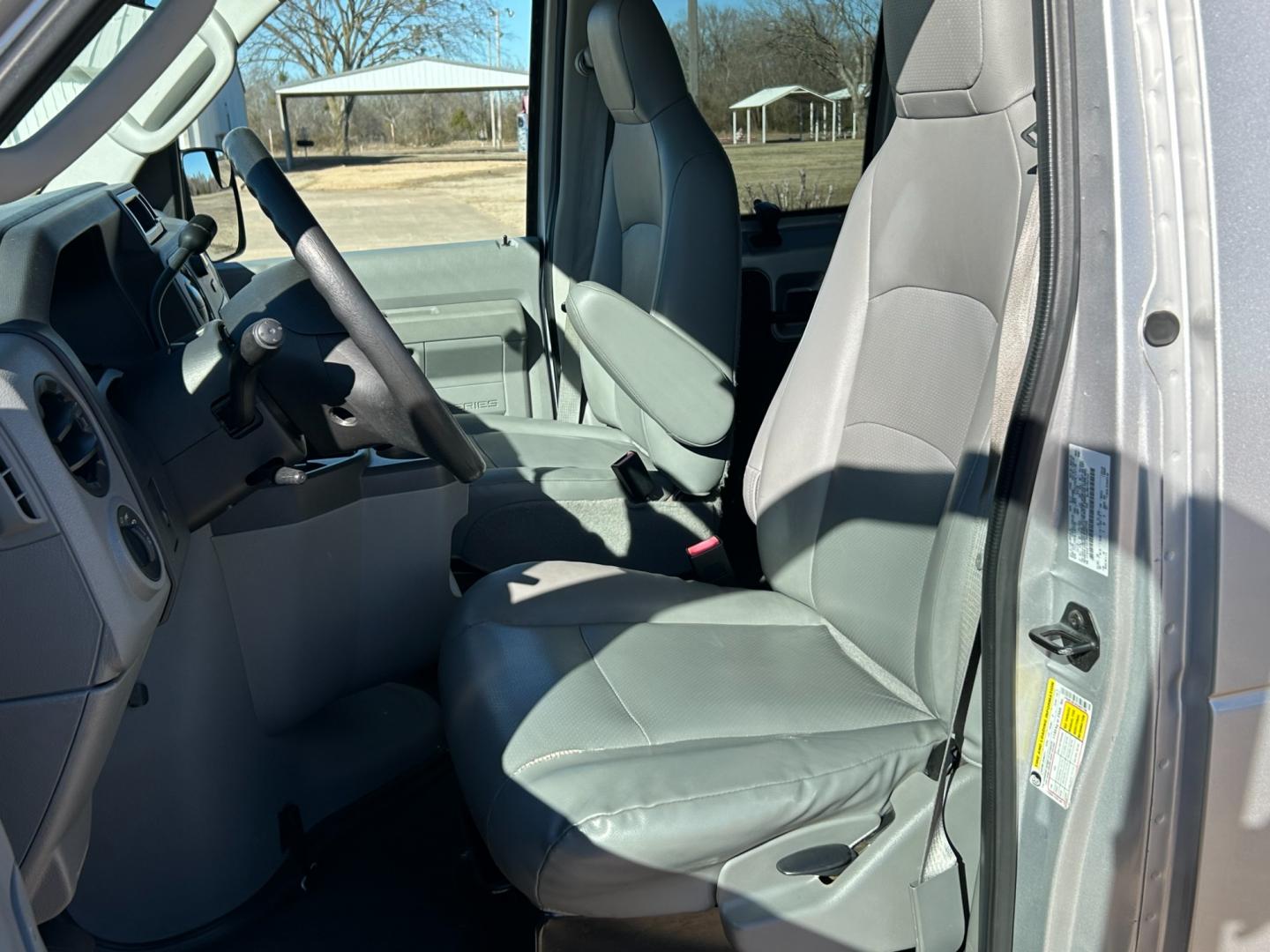 2012 Silver /Gray Ford E-Series Wagon (1FBNE3BL9CD) with an 5.4L V8 SOHC 16V engine, located at 17760 Hwy 62, Morris, OK, 74445, (918) 733-4887, 35.609104, -95.877060 - 2012 FORD ECONOLINE PASSENGER VAN HAS THE 5.4L V8 ENGINE. DEDICATED CNG (ONLY RUNS ON COMPRESSED NATURAL GAS)THIS IS A 12 PERSON PASSENGER VAN, MANUAL SEATS, MANUAL LOCKS, MANUAL, WINDOWS. AMFM STEREO, AUX PORT, FRONT AND REAR AC CONTROL, LEATHER SEATS, ONLY 54,186 MILES, 225/75R16 TIRES. THIS VAN I - Photo#8